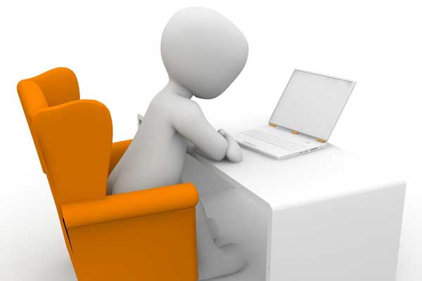 3d Person at a Desk Looking at a laptop