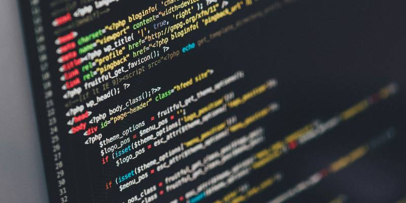 Computer screen running code.