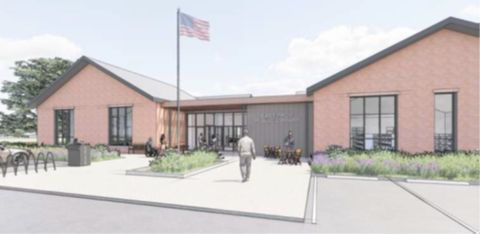 Picture of library with flagpole in front.